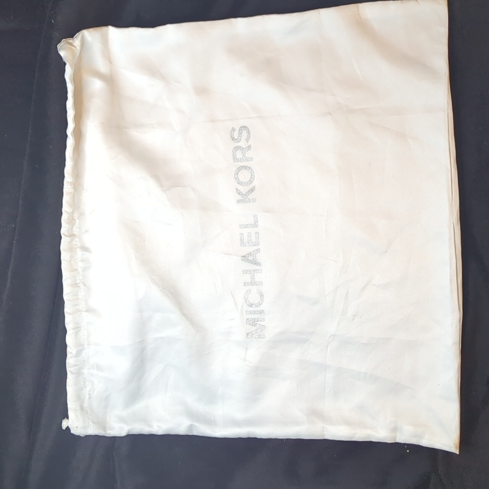 Michael Kors dust bag with draw string top.